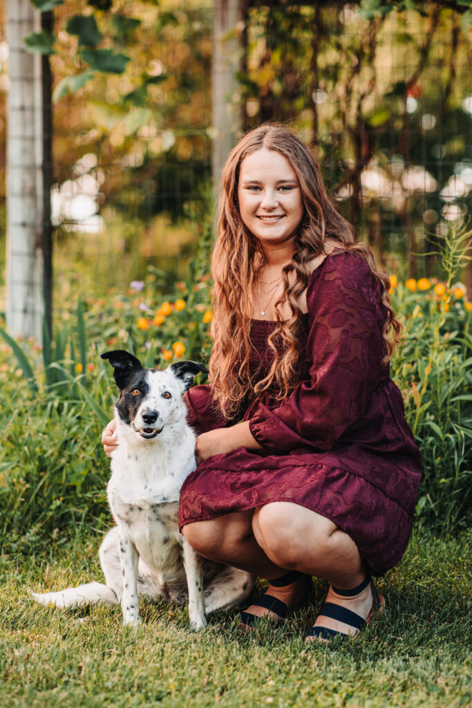 Capturing Megan’s joyful moment with her dog Maggie in the backyard