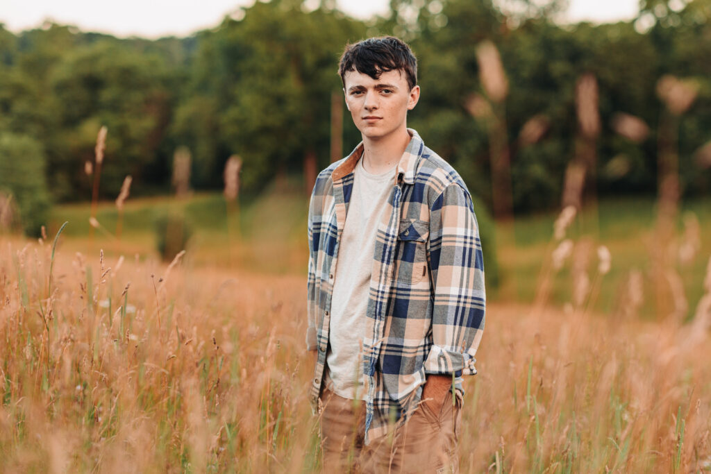 Ian Wacker enjoying his senior photo session despite the humid weather