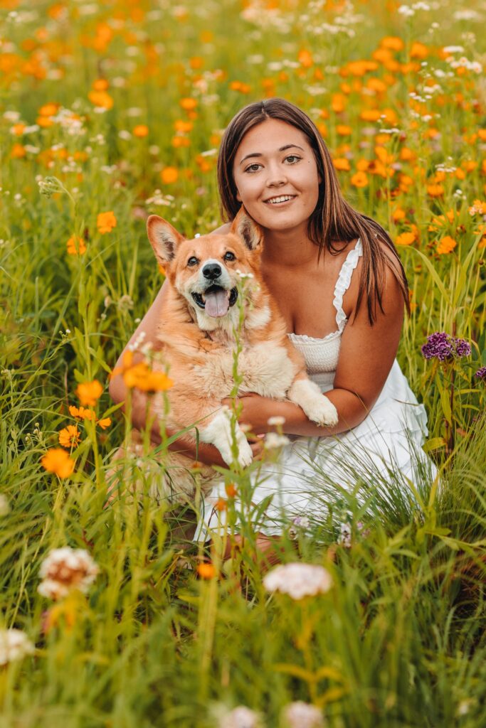 high school senior girl with her dog