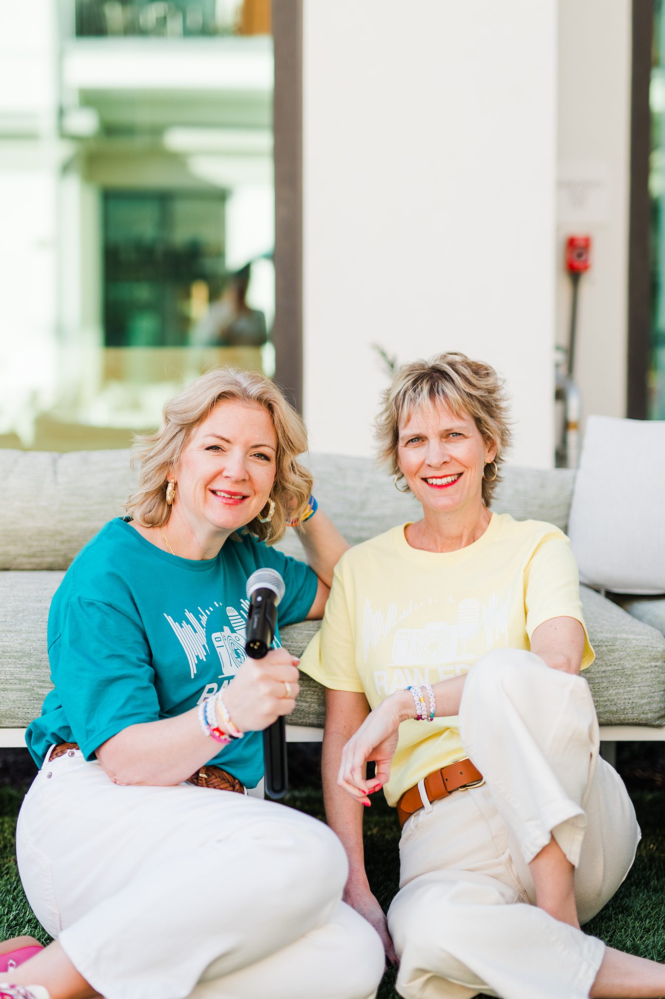 photographers sitting with podcast gear in their hands